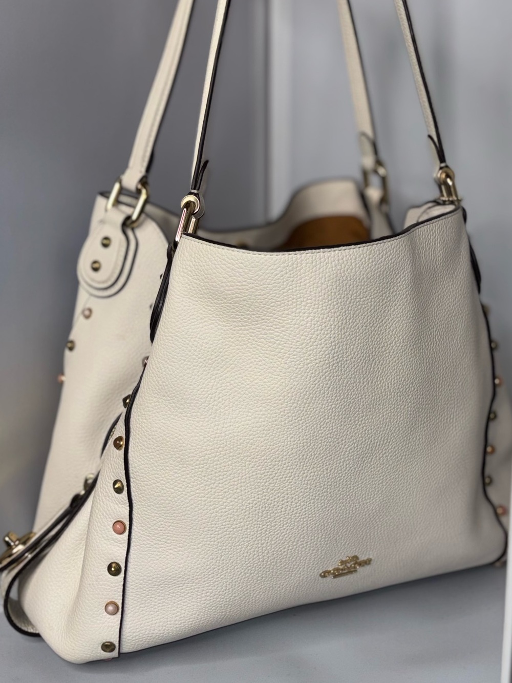 Coach Edie 31 Pebble Leather Shoulder Bag with Border Rivets – Chalk/ivory